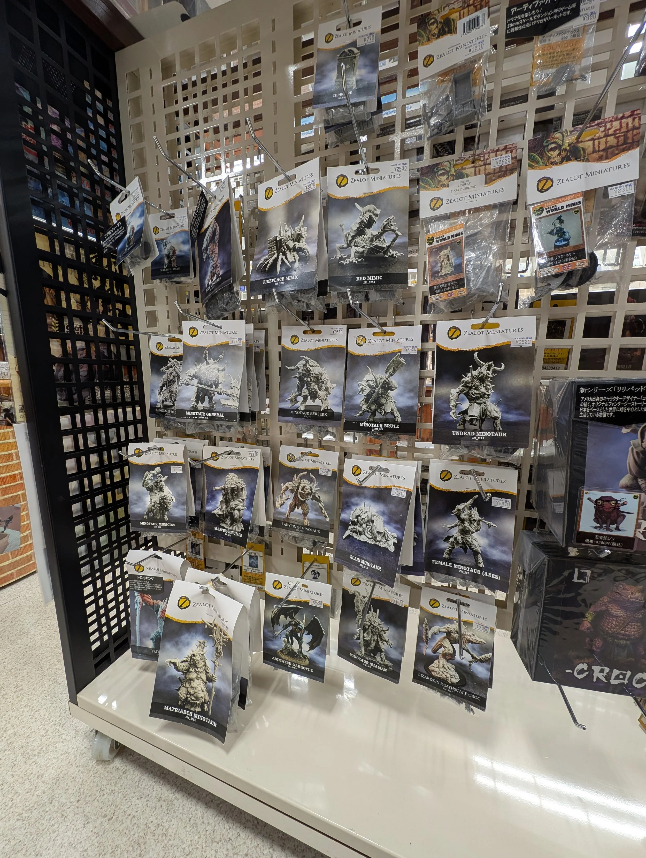 Shelves of miniature models and hobby products.